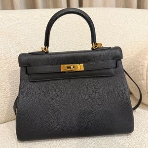 Black leather handbag with Gold Accents